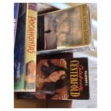 Box of VHS Tapes including Pocahontas, Shrek, and The Lion King among others