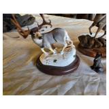 Animal Figurines and Sculptures Lot featuring a ram, deer, elephant, and cat-shaped items, as well as a small fox figurine