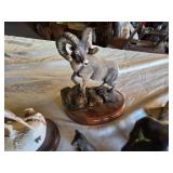 Animal Figurines and Sculptures Lot featuring a ram, deer, elephant, and cat-shaped items, as well as a small fox figurine