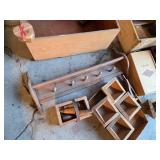 Mixed wood and decor items including wooden boxes, shelves, and a coat rack