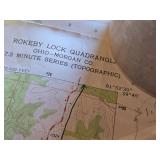 Various topographic maps from Ohio, a Globemaster 12 Inch Diameter Globe, and a red, white, and blue Norwegian flag