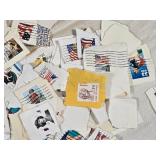 Lot of Postage Stamps Featuring Various Designs and Themes