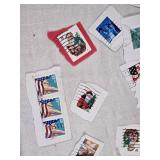 Collection of Vintage USA Postage Stamps Including Christmas, Love, and Flag Designs