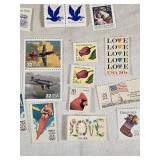 Lot of Vintage UNUSED USA Postage Stamps Including Christmas, Love, and Aviation Themes
