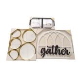 Home decor set with a sleek circular mirror, a "gather" sign, and small signs that say "family" and "happy place.