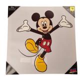 Three Disney pictures on canvases: Mickey Mouse, Disney Princess, and The Nightmare Before Christmas.