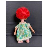 Two Vintage Vinyl Dolls - Red-Haired Floral Dress Doll & Orange-Haired Yellow Romper Doll