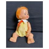 Two Vintage Vinyl Dolls - Red-Haired Floral Dress Doll & Orange-Haired Yellow Romper Doll