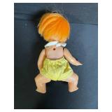 Two Vintage Vinyl Dolls - Red-Haired Floral Dress Doll & Orange-Haired Yellow Romper Doll