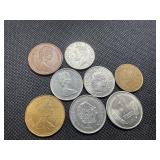 Eight High Quality Foreign Coins, including an 80% Silver Canadian Quarter