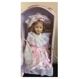 LR - Three Collectible Dolls in Pastel Lace Dresses with Display Cases