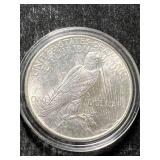 1925 US PEACE SILVER DOLLAR IN AIRTITE