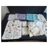Vintage Linens Collection Including Doilies, Embroidered Mats, and Lace Pieces