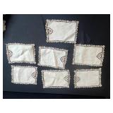 Vintage Linens Collection Including Doilies, Embroidered Mats, and Lace Pieces