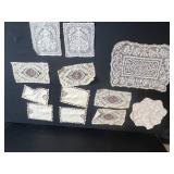Vintage Linens Collection Including Doilies, Embroidered Mats, and Lace Pieces