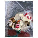 Collection of Handmade Cross-Stitch Ornaments and Craft Supplies