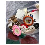 Collection of Handmade Cross-Stitch Ornaments and Craft Supplies