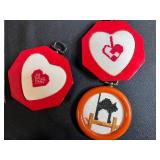 Collection of Handmade Cross-Stitch Ornaments and Craft Supplies