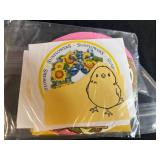 Collection of Handmade Cross-Stitch Ornaments and Craft Supplies