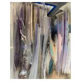 Collection of Handmade Cross-Stitch Ornaments and Craft Supplies