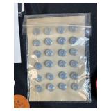 Collection of Handmade Cross-Stitch Ornaments and Craft Supplies