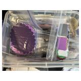 Collection of Handmade Cross-Stitch Ornaments and Craft Supplies