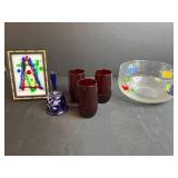 Mixed Glassware Collection with Fruit Bowl, Ruby Glasses, Handpainted Bell, and Framed Art