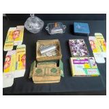 Vintage Kitchenware Collection with Cookie Cutters, Butter Boxes, Glass Dishes, and Decorative Tin