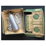 Vintage Kitchenware Collection with Cookie Cutters, Butter Boxes, Glass Dishes, and Decorative Tin