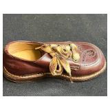 Collection of Vintage Metal Tins, Baby Shoes, Jacks, and Cat with Fishbowl Figurine