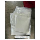 Storage Bin Lot with Chains, Clotheslines, Tarp, Bags, and Organizer Pouches