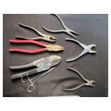 Box of Assorted Hand Tools including Pliers, Cutters, and Multi-Tool