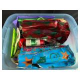Large Collection of Holiday and Gift Bags with Ribbons in Plastic Storage Tote