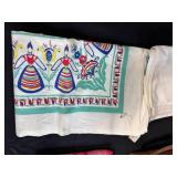 Vintage Woven Picnic Basket with Assorted Retro Table Linens