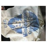 Vintage Handkerchief and Linen Collection with Basket, Flour Sack Apron, and Wooden Wine Holder