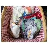 Vintage Handkerchief and Linen Collection with Basket, Flour Sack Apron, and Wooden Wine Holder