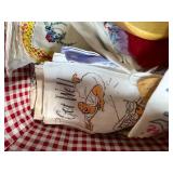 Vintage Handkerchief and Linen Collection with Basket, Flour Sack Apron, and Wooden Wine Holder