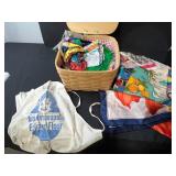 Vintage Handkerchief and Linen Collection with Basket, Flour Sack Apron, and Wooden Wine Holder