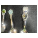 Set of 10 Collectible Souvenir Spoons with Decorative Emblems
