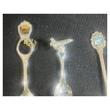 Collection of 12 Souvenir Collector Spoons with Decorative Handles