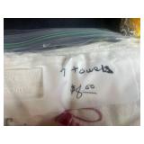 Vintage Woven Picnic Basket with Embroidered Tea Towels and Linens