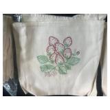 Vintage Woven Picnic Basket with Embroidered Tea Towels and Linens