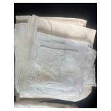 Vintage Woven Picnic Basket with Embroidered Tea Towels and Linens