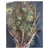 Large Arrangement of Peacock Feathers in Vintage Leather Fire Bucket Vase