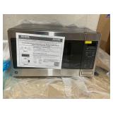 GE 1.6 Cu. Ft. Countertop Microwave Oven (Minor Transit Damage, See Photos)
