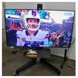 65" Samsung QB65R HDR 4K UHD (Ultra-High Def) Commercial Smart LED Display on Ergotron Neo-Flex Heavy-Duty Rolling TV Cart with Adjustable Shelf and Rotating TV Mount