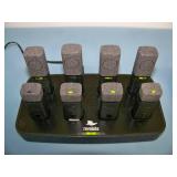 (24) Revolabs Wireless Lapel Mics / Microphones with (3) Charging Bases and (5) Replacement Mics that are NEW IN BOX