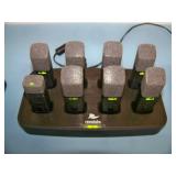 (24) Revolabs Wireless Lapel Mics / Microphones with (3) Charging Bases and (5) Replacement Mics that are NEW IN BOX