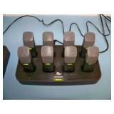 (24) Revolabs Wireless Lapel Mics / Microphones with (3) Charging Bases and (5) Replacement Mics that are NEW IN BOX