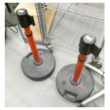 2 adjustable height stancions and one non-adj
